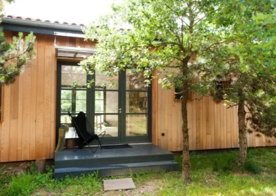 Maison design avec charpente apparente - Tradition Bois