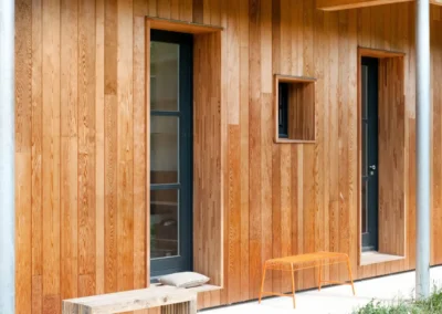 Maison design avec charpente apparente - Tradition Bois